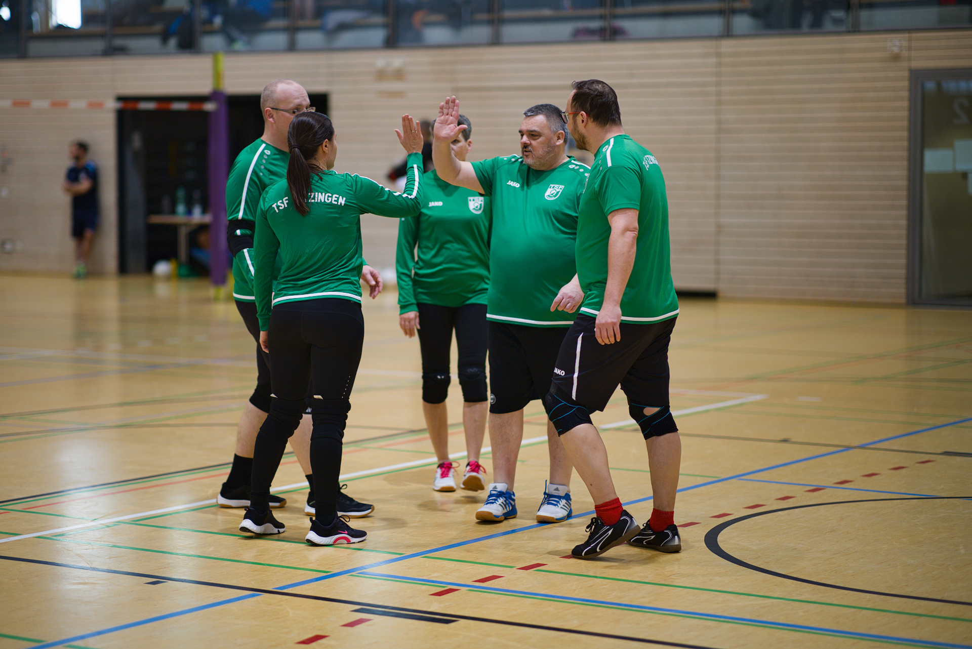 team abklatschen